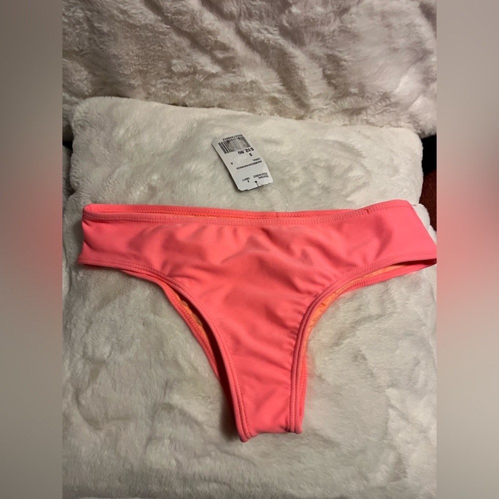 Forever 21 Coral bikini bottoms. Size small NWT.